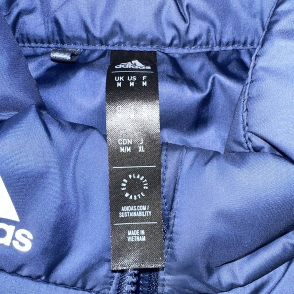 Adidas Puffer Vest‎ Size Medium. NWOT - Smirnoff logo